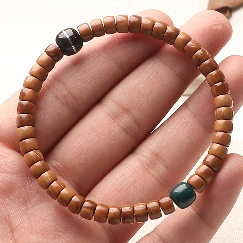 High Polished Indonesian Kuk Beads Bracelet: Straight Cut Extreme Arc Barrel Bodhi Prayer Beads, Unisex Gift
High Polished Indonesian Kuk Beads Bracelet: Straight Cut Extreme Arc Barrel Bodhi Prayer Beads, Unisex Gift