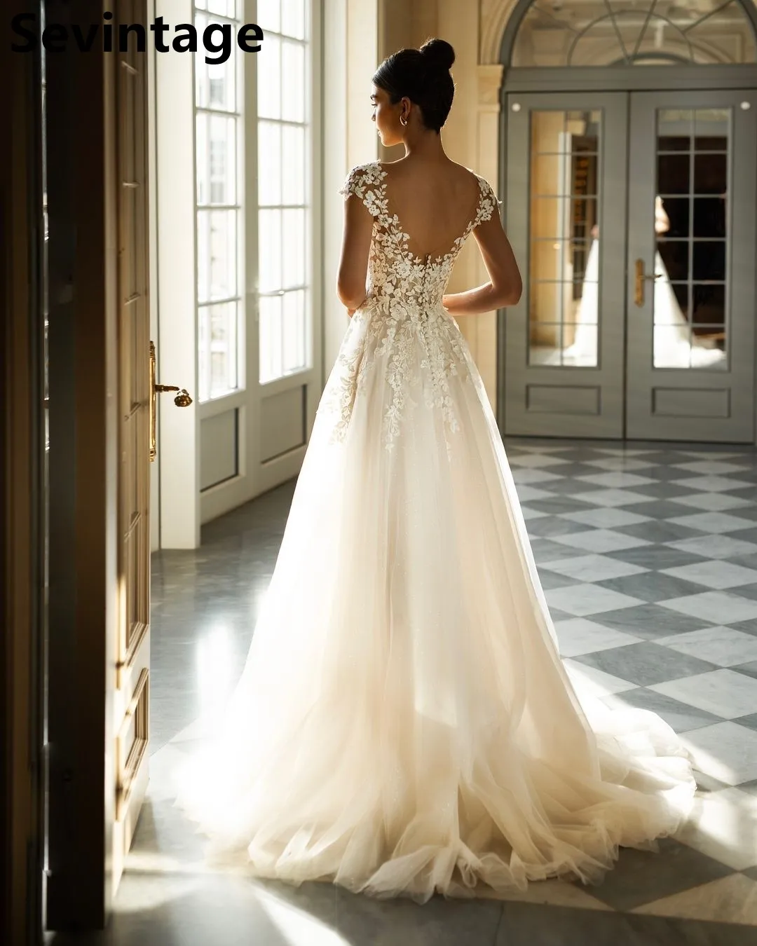 Sevintage 2025 Tulle Wedding Dress Appliques Lace Sexy Backless Cap Sleeve Elegant A Line Bridal Gowns robe de mariée Customized
Sevintage 2025 Tulle Wedding Dress Appliques Lace Sexy Backless Cap Sleeve Elegant A Line Bridal Gowns robe de mariée Customized