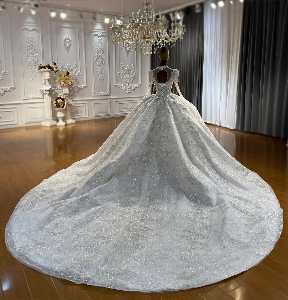 Luxury Long Sleeve Ball Gown Wedding Dress Custom made V Neck Crystal Beaded Cathedral Train Bridal Gown amanda novias official
Luxury Long Sleeve Ball Gown Wedding Dress Custom made V Neck Crystal Beaded Cathedral Train Bridal Gown amanda novias official