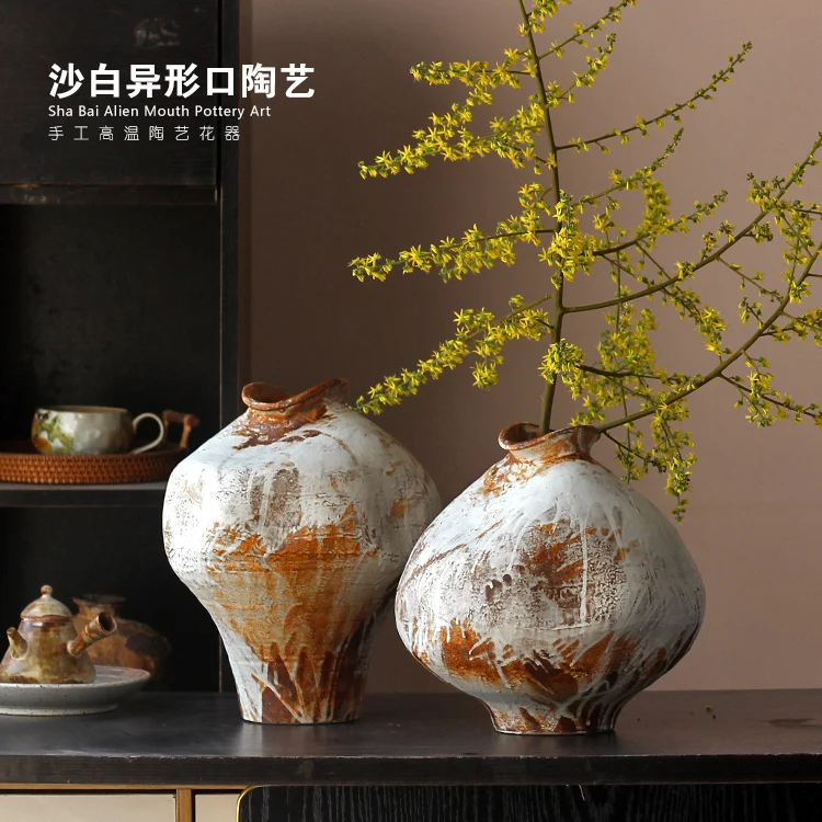 Retro creative handmade small mouth B & B hotel soft decoration ceramic jar vase
Retro creative handmade small mouth B & B hotel soft decoration ceramic jar vase