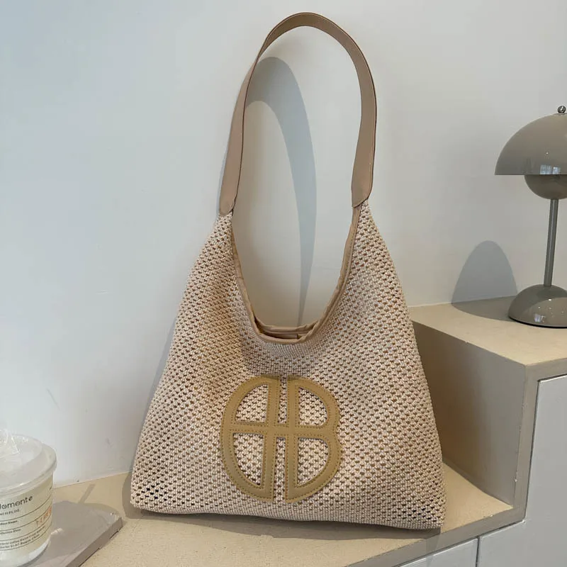 Luxury designer bag, niche hollowed out bag, ladies' 2025 new fashion woven shoulder bag, casual versatile armpit tote bag
Luxury designer bag, niche hollowed out bag, ladies' 2025 new fashion woven shoulder bag, casual versatile armpit tote bag