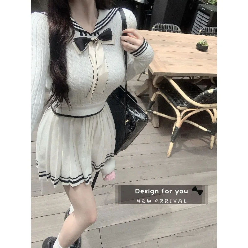 College Style Knitted Suit Women's Navy Collar Long Sleeve Bow Pullover Sweater Tops High Waist Slim Pleated Skirt Two-piece Set
College Style Knitted Suit Women's Navy Collar Long Sleeve Bow Pullover Sweater Tops High Waist Slim Pleated Skirt Two-piece Set