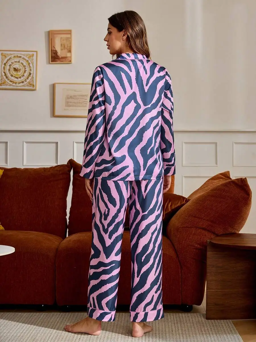 Women Pink And Zebra Print Pajama Set Lapel Long Sleeve Button Front Wide Leg Pants
Women Pink And Zebra Print Pajama Set Lapel Long Sleeve Button Front Wide Leg Pants