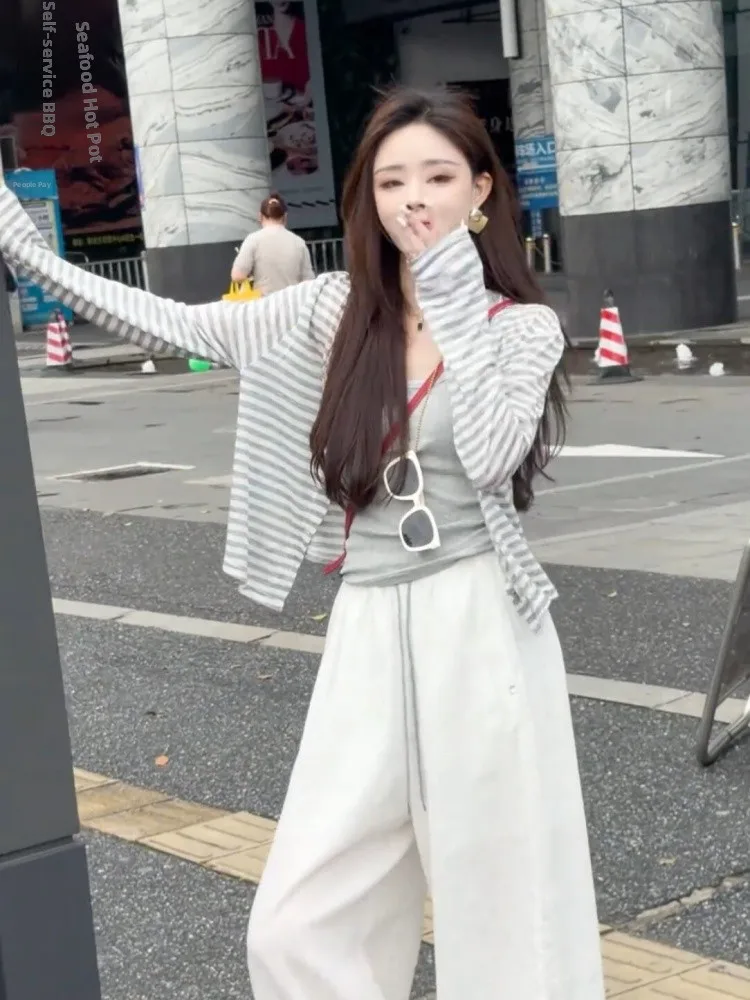 Gray Stripe Ice Silk Knitted Sun Protection Cardigan Women Summer Lazy Style Thin Long Sleeve Outerwear Air Conditioning Shirt
Gray Stripe Ice Silk Knitted Sun Protection Cardigan Women Summer Lazy Style Thin Long Sleeve Outerwear Air Conditioning Shirt