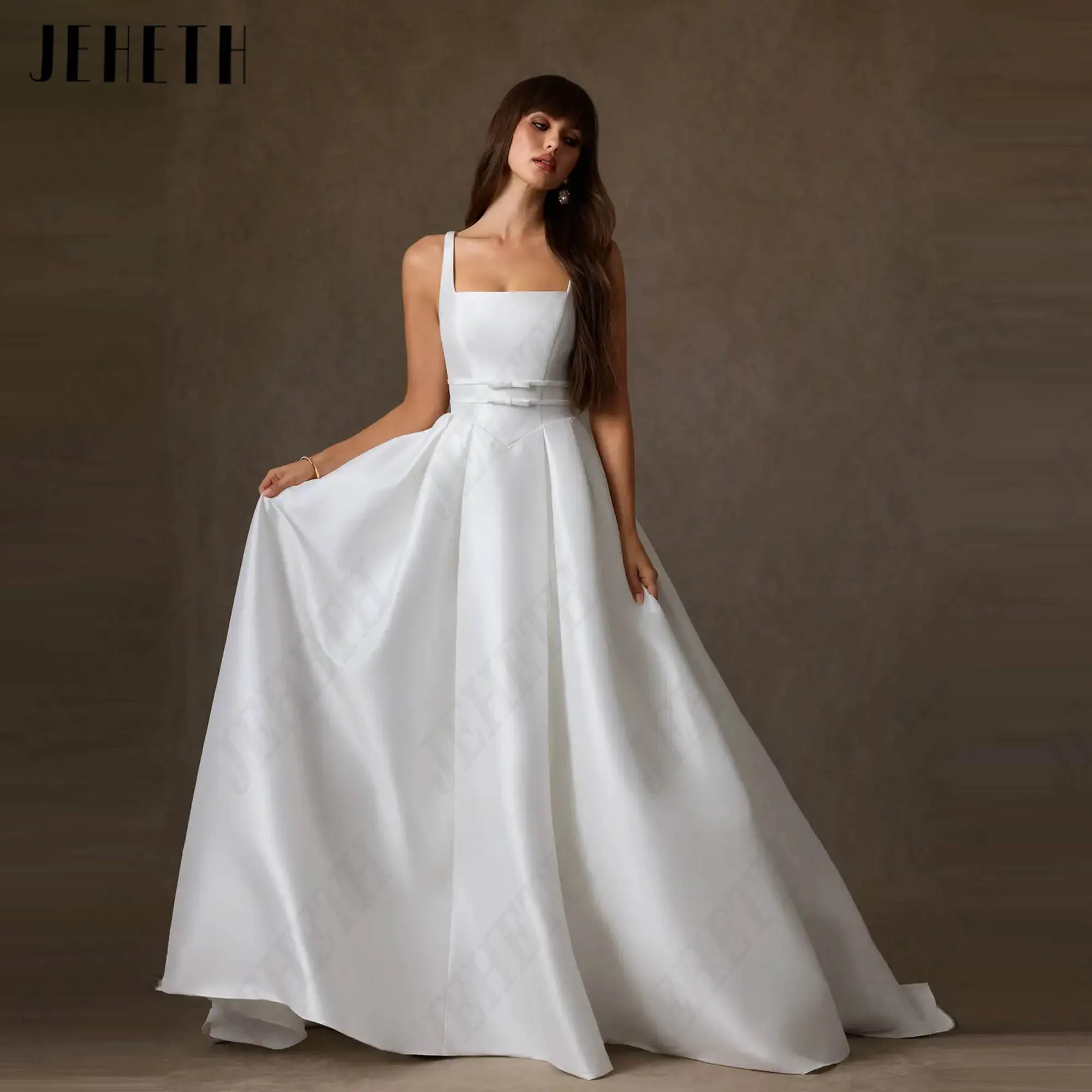 JEHETH Satin Square Neck Wedding Dress Simple A-line Sleeveless Bridal Gown Elegant Ball Gown with Bow robe de mariée Customized
JEHETH Satin Square Neck Wedding Dress Simple A-line Sleeveless Bridal Gown Elegant Ball Gown with Bow robe de mariée Customized