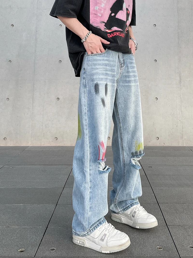 Graffiti Blue Wash Hole Jeans American Wide Leg Trousers Floor Slam Trousers Straight Leg Trousers Fashion Trend
Graffiti Blue Wash Hole Jeans American Wide Leg Trousers Floor Slam Trousers Straight Leg Trousers Fashion Trend