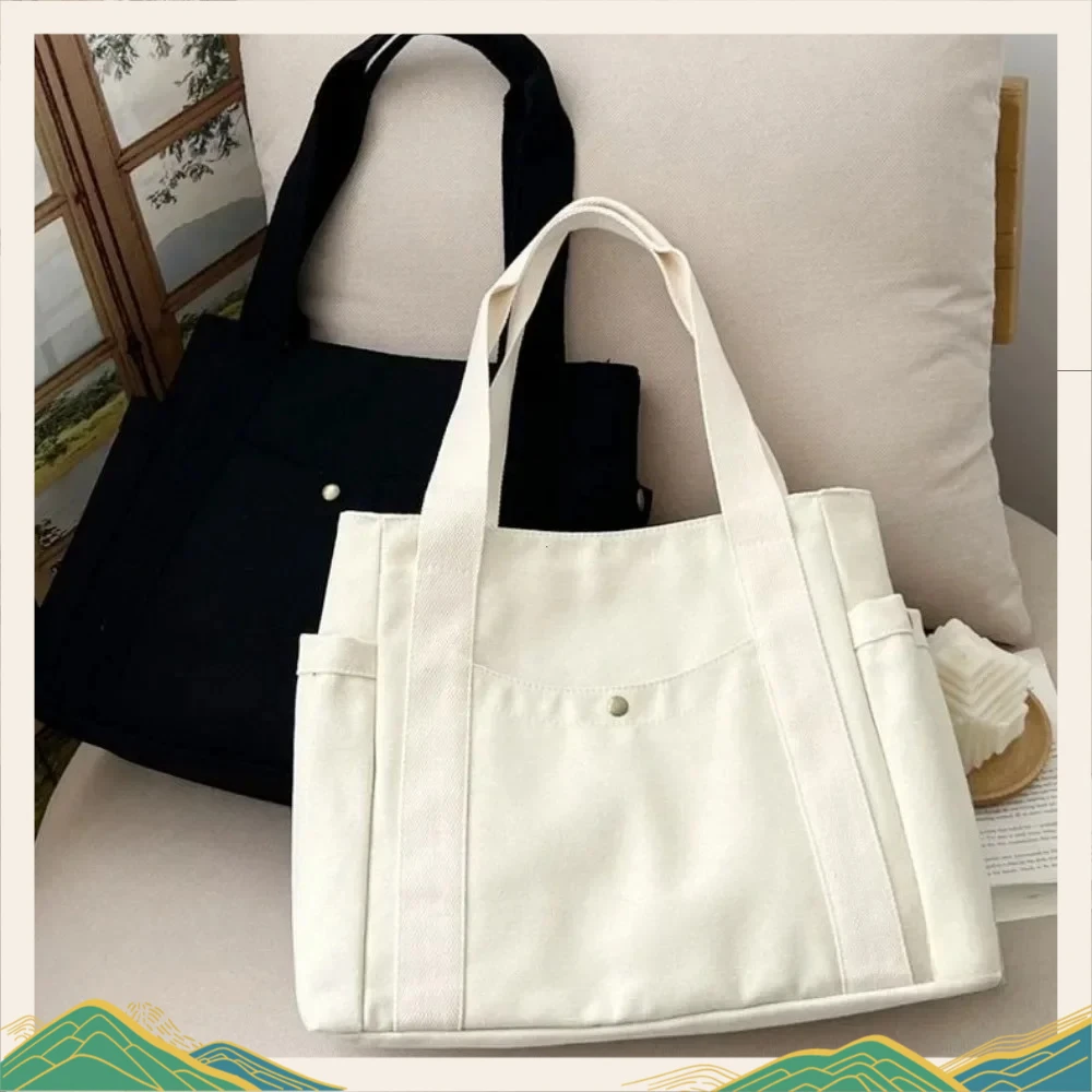 2026Large-capacity canvas commuter bag, preppy style and versatile, suitable for women to carry by hand or on the shoulder
2026Large-capacity canvas commuter bag, preppy style and versatile, suitable for women to carry by hand or on the shoulder