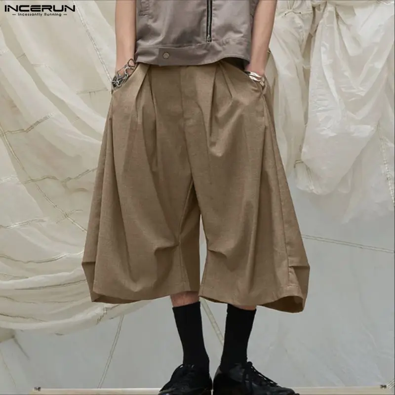 INCERUN Men's Wide Leg Pants Solid Button Joggers Casual Wide Leg Trousers Men Streetwear 2026 Fashion Loose Pants Pantalones
INCERUN Men's Wide Leg Pants Solid Button Joggers Casual Wide Leg Trousers Men Streetwear 2026 Fashion Loose Pants Pantalones