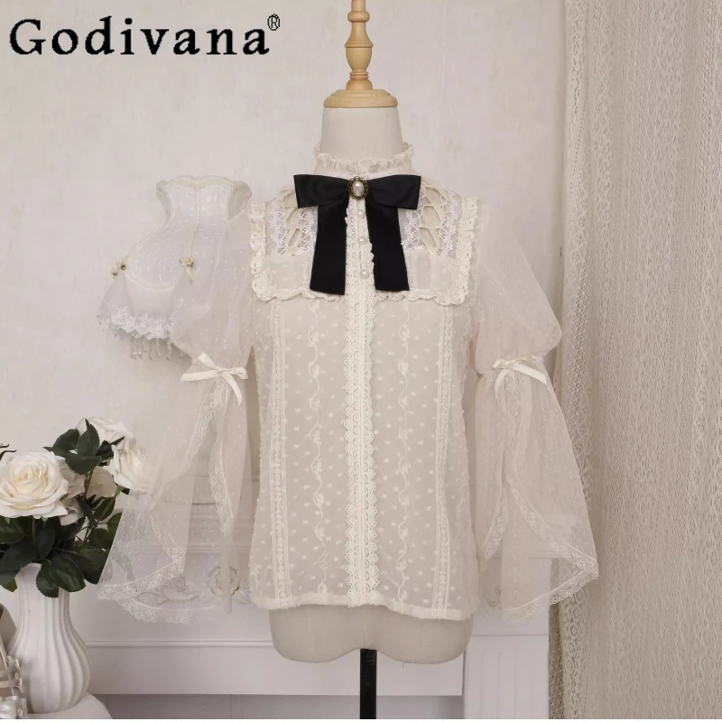 Elegant Lolita Sweet Bow Lace-up Hollow Long Sleeve Shirt 2025 Summer New Girls Stand-up Collar Light Versatile Age-reducing Top
Elegant Lolita Sweet Bow Lace-up Hollow Long Sleeve Shirt 2025 Summer New Girls Stand-up Collar Light Versatile Age-reducing Top