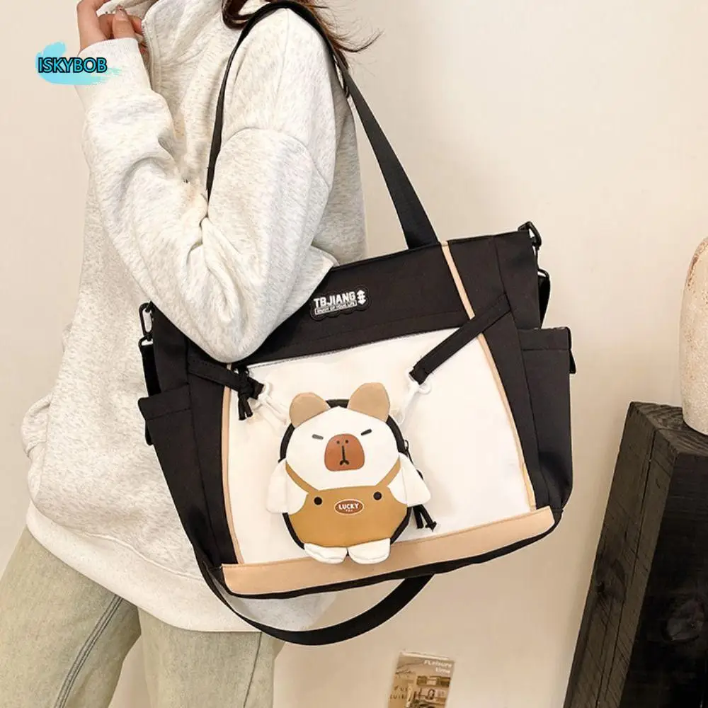 Portable Japanese Style Capybara Shoulder Bag Harajuku Causal Students School Bag Large Oxford Cloth Canvas Tote Bag Shopping
Portable Japanese Style Capybara Shoulder Bag Harajuku Causal Students School Bag Large Oxford Cloth Canvas Tote Bag Shopping