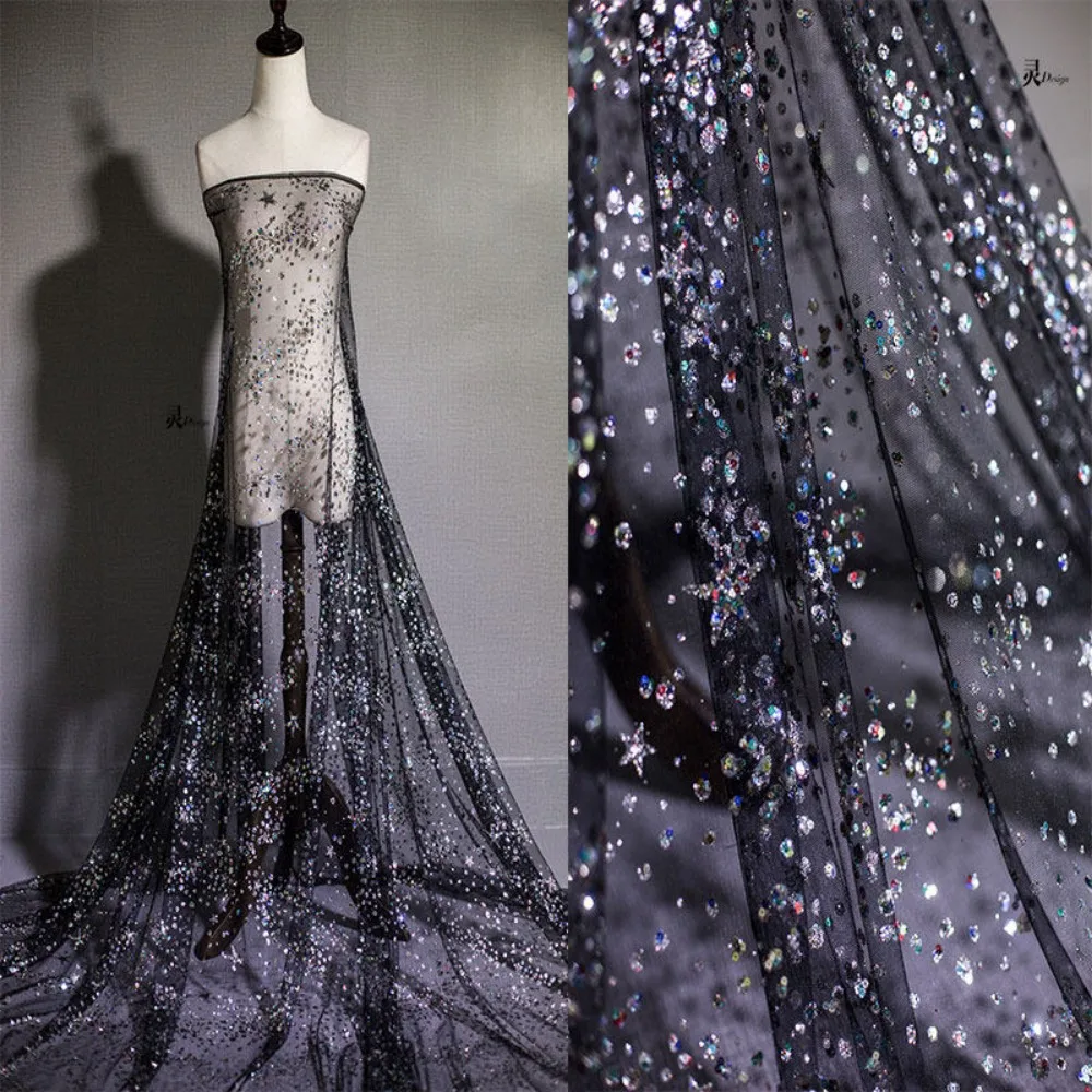 Designer Star Mesh Fabric - Black Iridescent Net with Rhinestones & Sequins - Shimmering Night Sky Tulle for Evening Gowns
Designer Star Mesh Fabric - Black Iridescent Net with Rhinestones & Sequins - Shimmering Night Sky Tulle for Evening Gowns