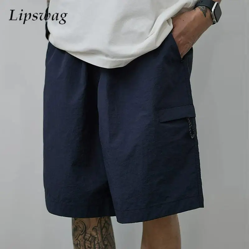 Sports Training Loose Quick-dry Shorts Mens Streetwear Fashion Solid Color Straight Shorts 2026 Summer Men Outdoor Casual Shorts
Sports Training Loose Quick-dry Shorts Mens Streetwear Fashion Solid Color Straight Shorts 2026 Summer Men Outdoor Casual Shorts