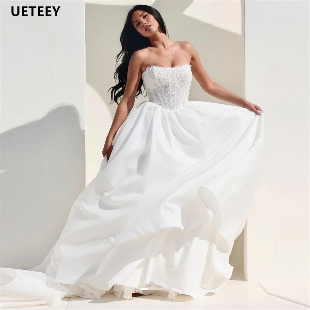 UETEEY Customized Strapless Appliques Taffeta A Line Wedding Dress Lace Up Back Bow Floor Length Bridal Gown vestidos de novia
UETEEY Customized Strapless Appliques Taffeta A Line Wedding Dress Lace Up Back Bow Floor Length Bridal Gown vestidos de novia
