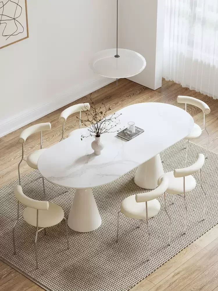 French cream wind rock board dining table household simple small apartment rectangular dining table
French cream wind rock board dining table household simple small apartment rectangular dining table