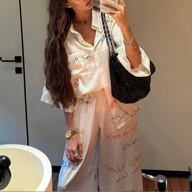 Spring Elegant Turn-down Collar Button Top & Long Pants Outfit Casual Streetwear Loose Two Piece Set for Women Letter Print Suit
Spring Elegant Turn-down Collar Button Top & Long Pants Outfit Casual Streetwear Loose Two Piece Set for Women Letter Print Suit