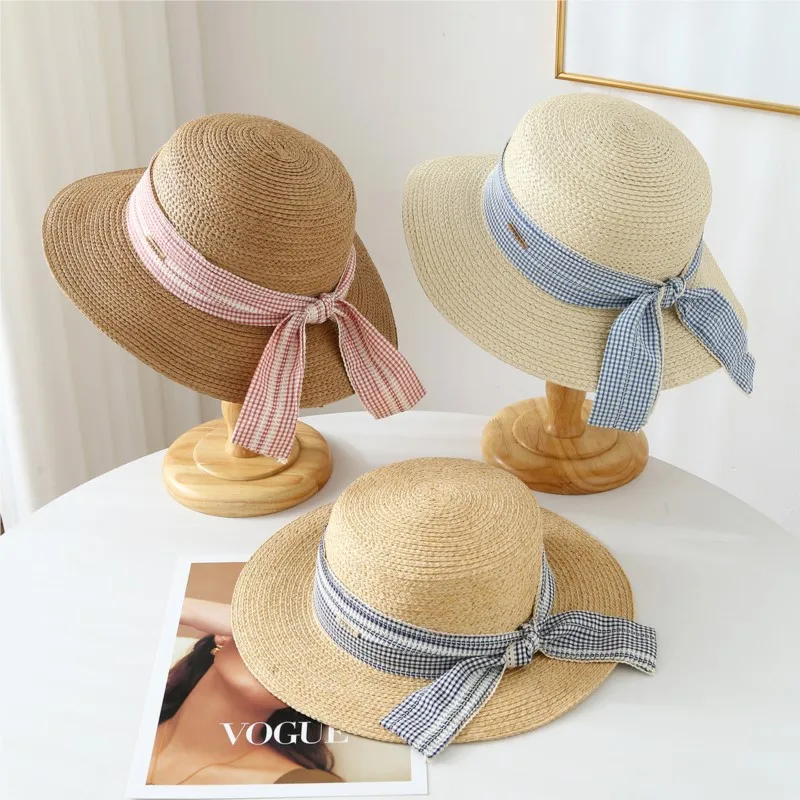 This blue checkered ribbon woven flat top hat is a versatile women's and shade that can make your face smaller
This blue checkered ribbon woven flat top hat is a versatile women's and shade that can make your face smaller