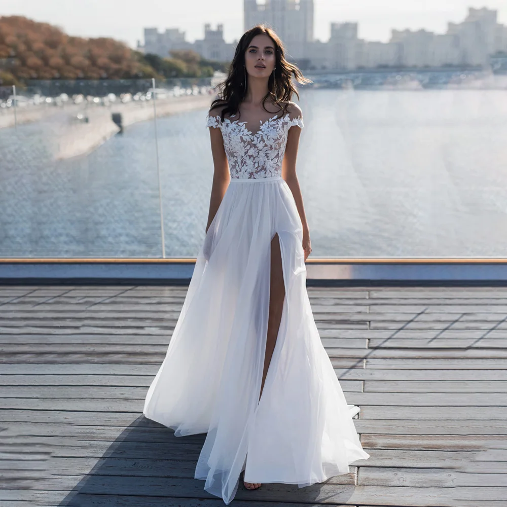 Classic Tank Appliques Tulle Wedding Dress Side Split Wedding Gowns Backless A-line Court Bridal Gown Illusion vestido de novia
Classic Tank Appliques Tulle Wedding Dress Side Split Wedding Gowns Backless A-line Court Bridal Gown Illusion vestido de novia