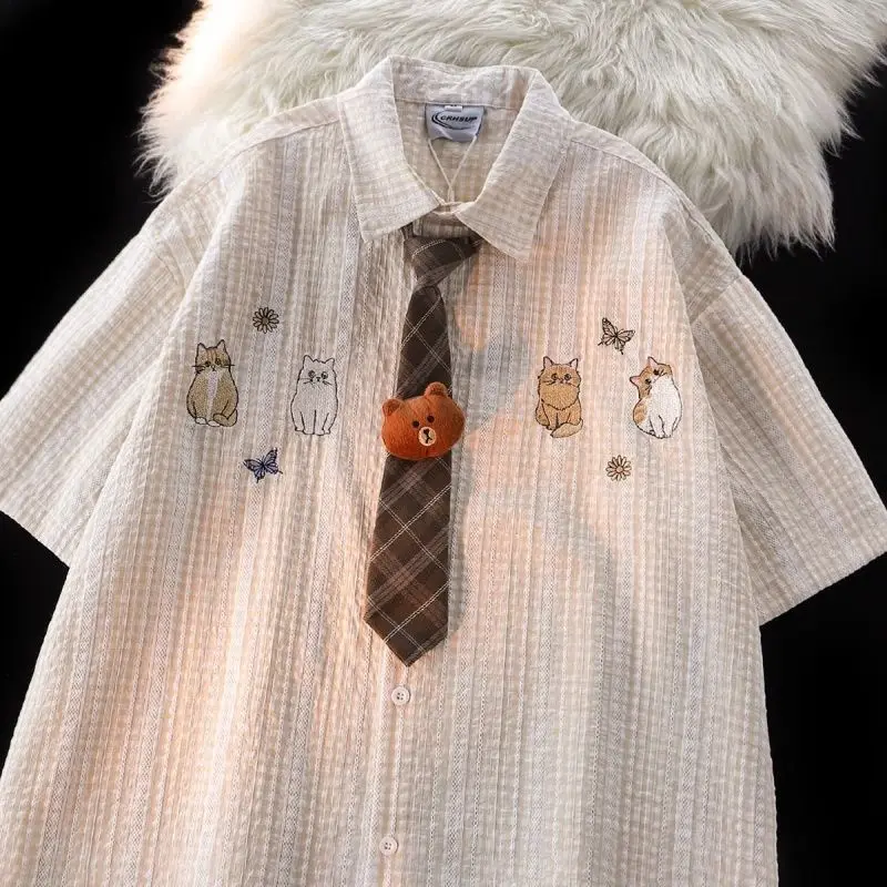 Japanese high street men and women trendy personality grid polo tie cat short sleeved shirt summer couple loose retro casual top
Japanese high street men and women trendy personality grid polo tie cat short sleeved shirt summer couple loose retro casual top
