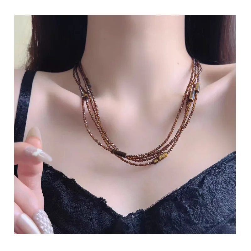 Multi-layer Coffee Crystal Beaded Long Necklace Female Tiger Eye Stone Neck Chain Niche Fashion Stacked Collarbone Chain
Multi-layer Coffee Crystal Beaded Long Necklace Female Tiger Eye Stone Neck Chain Niche Fashion Stacked Collarbone Chain