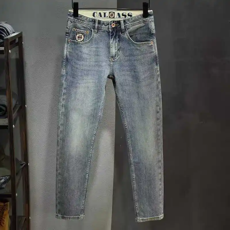 Высококачественные ретро-джинсы с вышивкой, мужские, корейский стиль, зауженные, эластичные, повседневные, длиной до щиколотки, молодежная модная одежда
Высококачественные ретро-джинсы с вышивкой, мужские, корейский стиль, зауженные, эластичные, повседневные, длиной до щиколотки, молодежная модная одежда