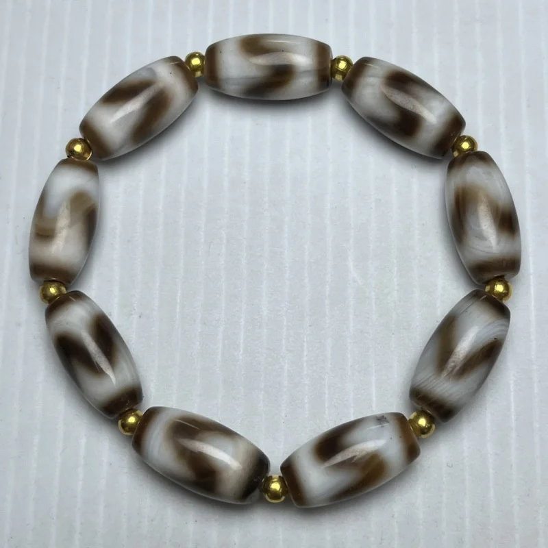 Бусина Дзи в античном стиле с тигровым зубом, винтажный браслет ручной работы для мужчин и женщин, модный и универсальный.
Бусина Дзи в античном стиле с тигровым зубом, винтажный браслет ручной работы для мужчин и женщин, модный и универсальный.