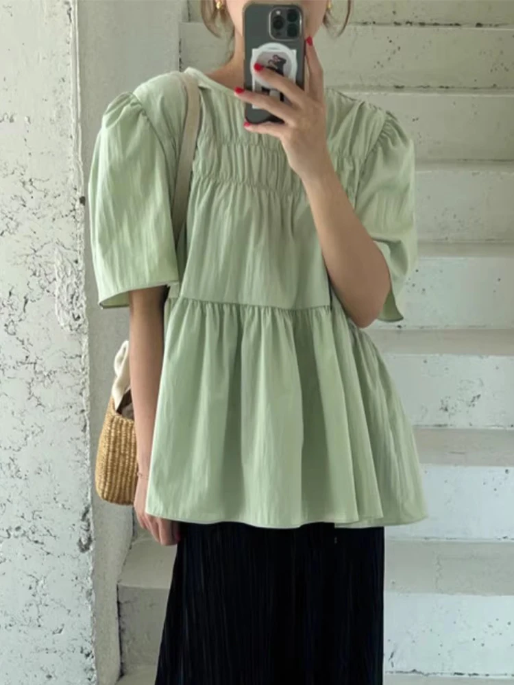 Retro Dongdaemun Summer irt for Women round Ne Pleated Design Loose Bubble Sve Doll Top Korean Sle Casual irt
Retro Dongdaemun Summer irt for Women round Ne Pleated Design Loose Bubble Sve Doll Top Korean Sle Casual irt