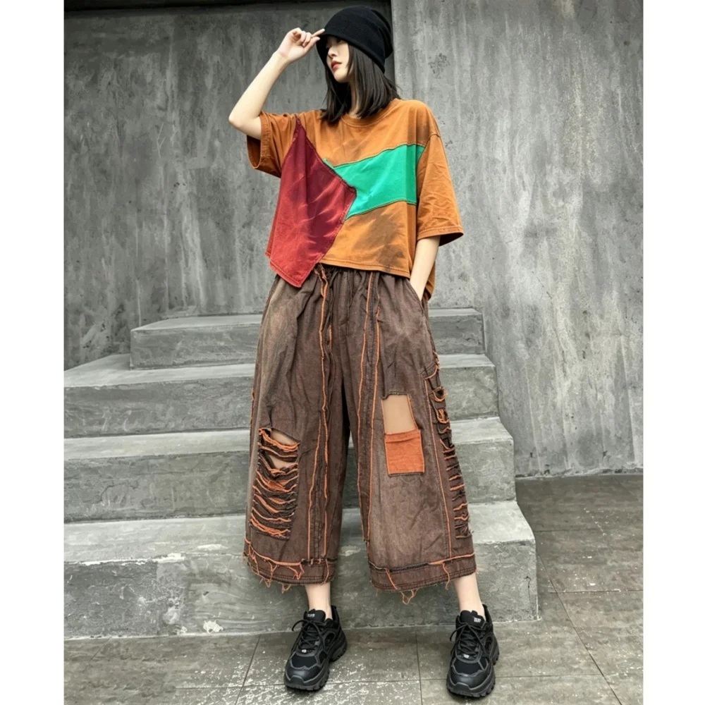 Trendy Cool Loose Fashion Suit Women Distressed Color-blocking Irregular T-shirt + Denim Wide-leg Pants Two-piece Set XY251
Trendy Cool Loose Fashion Suit Women Distressed Color-blocking Irregular T-shirt + Denim Wide-leg Pants Two-piece Set XY251