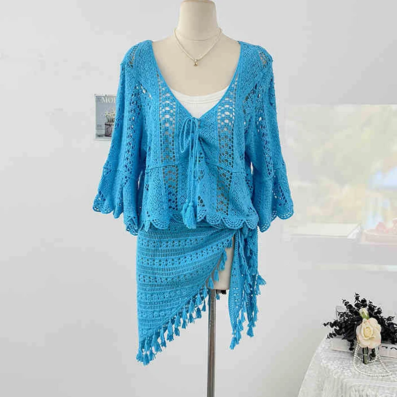 Fashion Seaside Vacation Set Women Hollow Out Lace-up Loose Sunscreen Top Irregular Tassel Mini Half Skirt Summer New 
Fashion Seaside Vacation Set Women Hollow Out Lace-up Loose Sunscreen Top Irregular Tassel Mini Half Skirt Summer New