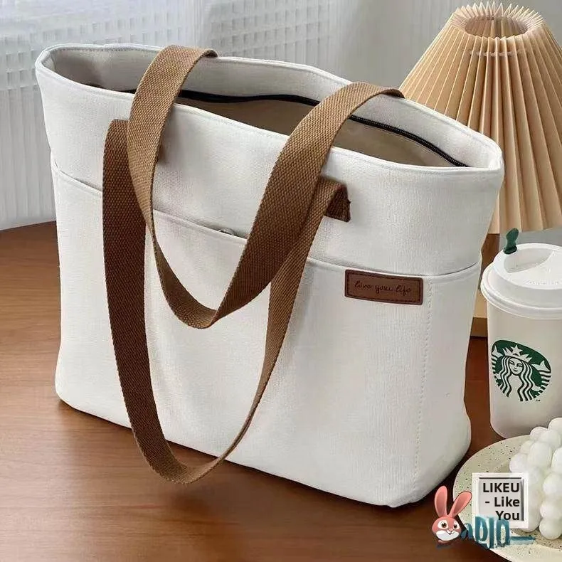 Large Capacity Canvas Bag Women's Commuter Tote Simple Korean Style Versatile Book Bag for College Students And Office Workers
Large Capacity Canvas Bag Women's Commuter Tote Simple Korean Style Versatile Book Bag for College Students And Office Workers