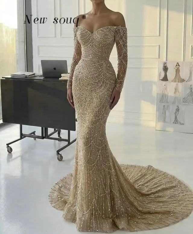 Элегантные вечерние платья-русалки цвета шампань с открытыми плечами, расшитые бисером, для арабских торжественных мероприятий, свадеб и вечеринок, на заказ
Элегантные вечерние платья-русалки цвета шампань с открытыми плечами, расшитые бисером, для арабских торжественных мероприятий, свадеб и вечеринок, на заказ