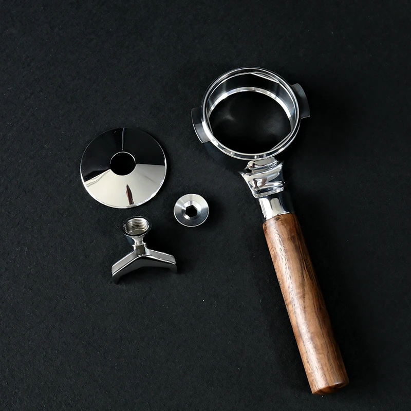 The Portafilter With Walnut Handle and Changeable Bottom (bottomless & Spouted)
The Portafilter With Walnut Handle and Changeable Bottom (bottomless & Spouted)