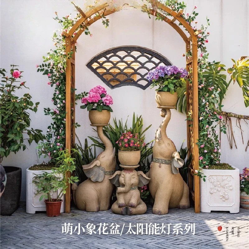 Chinese-style courtyard landscaping arrangement cute baby elephant flower pot villa garden decoration
Chinese-style courtyard landscaping arrangement cute baby elephant flower pot villa garden decoration
