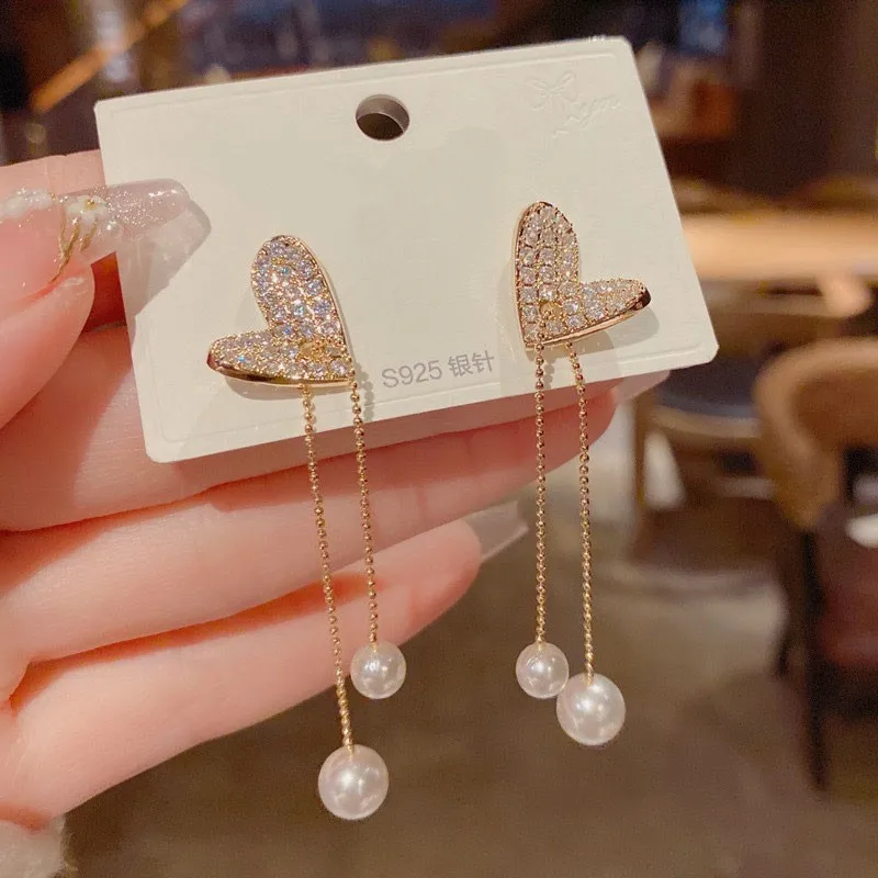 Korean Fashion Pearl Tassel Drop Earrings For Women Jewelry 2025 Trending New Luxury Women's Crystal Heart Earrings Accessories
Korean Fashion Pearl Tassel Drop Earrings For Women Jewelry 2025 Trending New Luxury Women's Crystal Heart Earrings Accessories