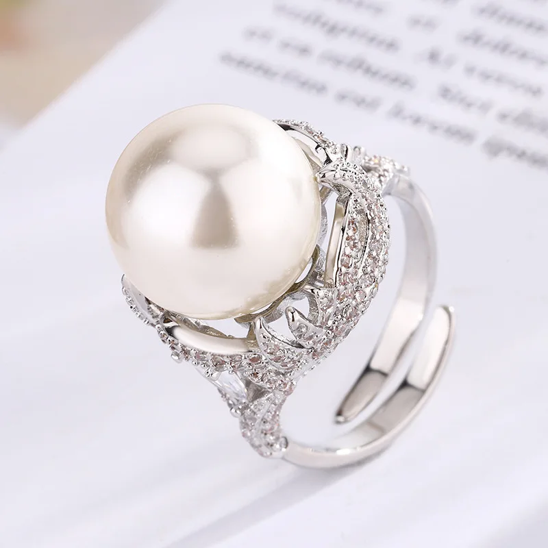 New Jewelry Copper Plated White Gold Pearl High-Grade Vintage Ring for Women 14mm Wholesale
New Jewelry Copper Plated White Gold Pearl High-Grade Vintage Ring for Women 14mm Wholesale