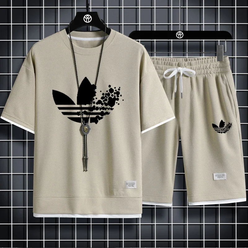 Men's clothing new fashion printed short-sleeved T-shirt + shorts two-piece breathable quick-drying sports casual jogging suit
Men's clothing new fashion printed short-sleeved T-shirt + shorts two-piece breathable quick-drying sports casual jogging suit