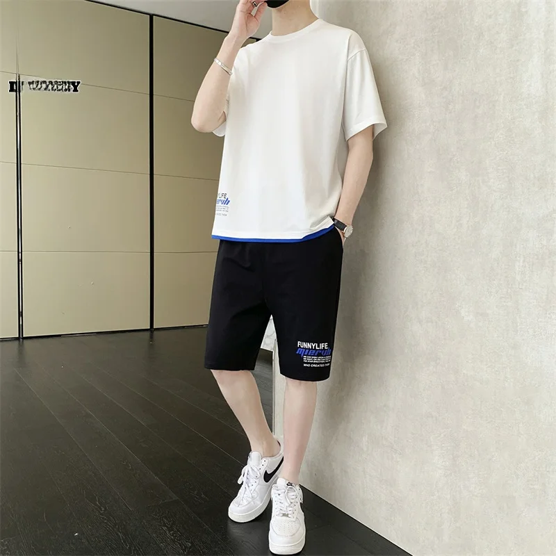 Men's ort Sve T-irt And orts Casual Set Lightweight Summer Faion Top Bot Two-Piece Suit Cotton 00%
Men's ort Sve T-irt And orts Casual Set Lightweight Summer Faion Top Bot Two-Piece Suit Cotton 00%