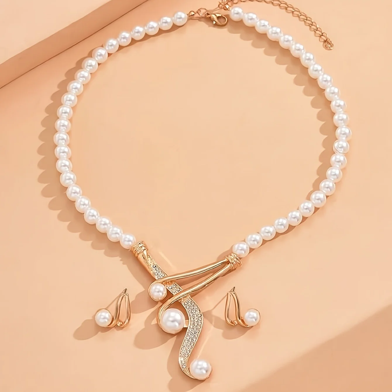 Elegant Round Faux Pearl Necklace & Geometric Pearl Earrings Set – Timeless Fashion Jewelry, Perfect Gift for Lovers & Friends
Elegant Round Faux Pearl Necklace & Geometric Pearl Earrings Set – Timeless Fashion Jewelry, Perfect Gift for Lovers & Friends