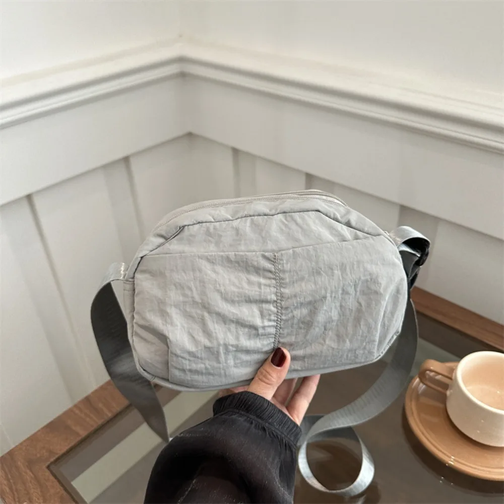 Быстросохнущая нейлоновая квадратная сумка, сумка-мессенджер в японском стиле, сумка через плечо на молнии, большая вместимость, универсальная поясная сумка для покупок
Быстросохнущая нейлоновая квадратная сумка, сумка-мессенджер в японском стиле, сумка через плечо на молнии, большая вместимость, универсальная поясная сумка для покупок