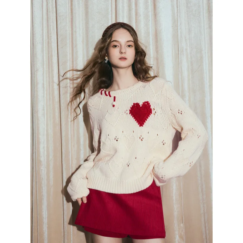 Heart Pattern Openwork Cardigan - Cozy Layer for Snowy Nights
Heart Pattern Openwork Cardigan - Cozy Layer for Snowy Nights