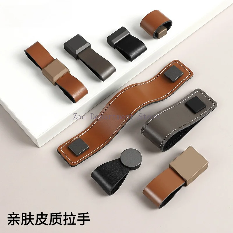 High-grade cowhide handle drawer tatami wardrobe saddle leather light luxury single hole pull ring leather anti-collision handle
High-grade cowhide handle drawer tatami wardrobe saddle leather light luxury single hole pull ring leather anti-collision handle