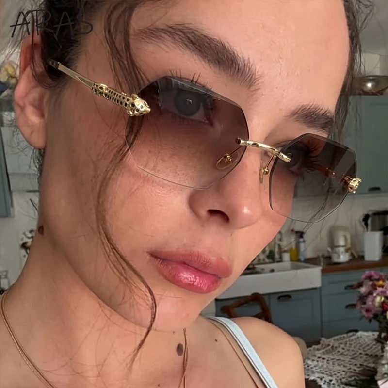 Photochromic Punk Rimless Sunglasses Women 2026 Luxury Designer Leopard Head Vintage Frameless Sun Glasses Geometric Metal Shade
Photochromic Punk Rimless Sunglasses Women 2026 Luxury Designer Leopard Head Vintage Frameless Sun Glasses Geometric Metal Shade