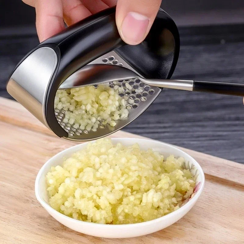 1pcs Kitchen manual garlic press stainless steel garlic press vegetable household gadget accessories Food slicer Onion cutter
1pcs Kitchen manual garlic press stainless steel garlic press vegetable household gadget accessories Food slicer Onion cutter