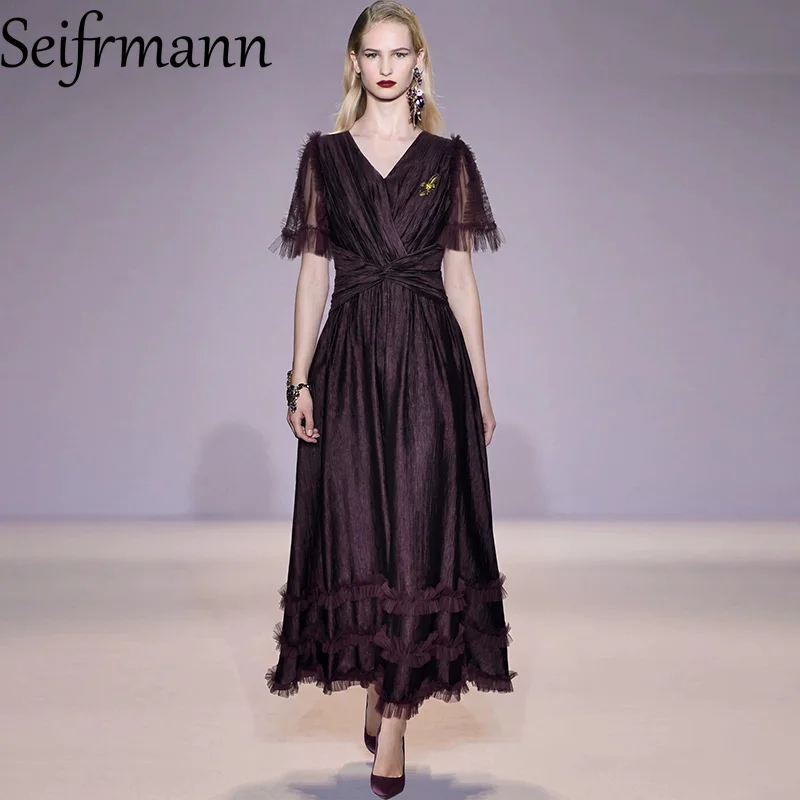 Seifrmann Solid color pleated ruffle edge dress V-neck short sleeved waist long dress 2026 summer fashionable women's clothing
Seifrmann Solid color pleated ruffle edge dress V-neck short sleeved waist long dress 2026 summer fashionable women's clothing