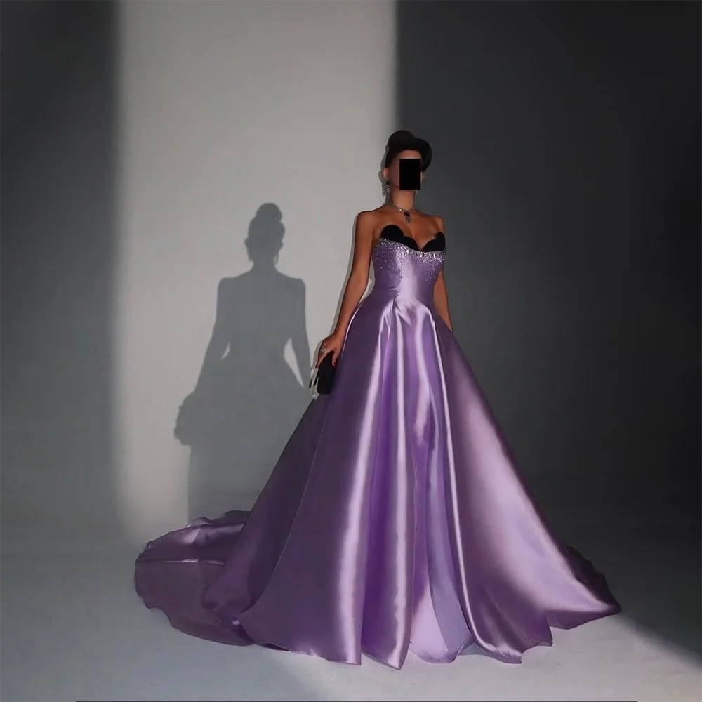 Сиреневое атласное длинное платье для выпускного вечера без бретелек со складками и кристаллами, вечерние платья трапециевидной формы с открытой спиной и скользящим шлейфом, вечерние платья по индивидуальному заказу
Сиреневое атласное длинное платье для выпускного вечера без бретелек со складками и кристаллами, вечерние платья трапециевидной формы с открытой спиной и скользящим шлейфом, вечерние платья по индивидуальному заказу