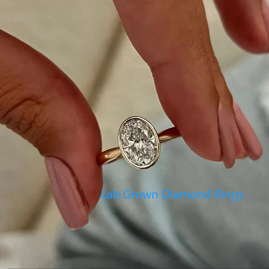1.5CT Oval Cut Lab Grown Diamond Solitaire Ring Bezel Set Engagement Ring CVD HPHT DEF VS-VVS 14k Two-Tone Gold Tapered Ring IGI
1.5CT Oval Cut Lab Grown Diamond Solitaire Ring Bezel Set Engagement Ring CVD HPHT DEF VS-VVS 14k Two-Tone Gold Tapered Ring IGI