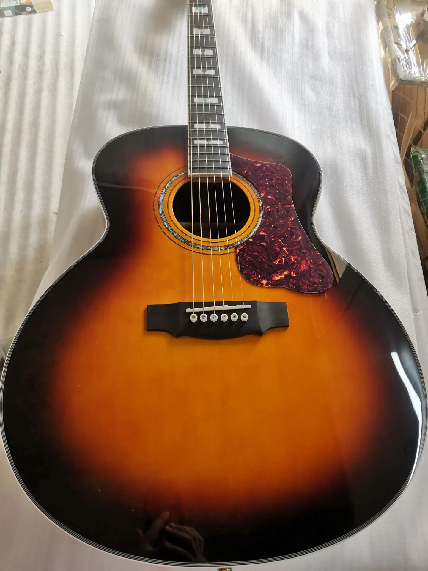 6-string guitar, all solid wood Guild F-55, sunburst handmade guitar with soundhole pickups
6-string guitar, all solid wood Guild F-55, sunburst handmade guitar with soundhole pickups