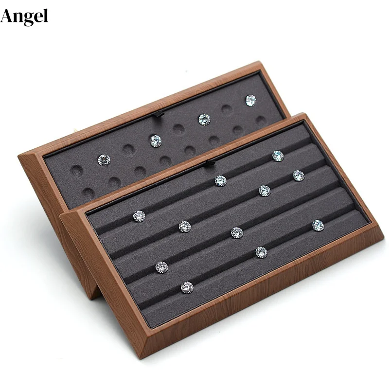 Профессиональный лоток для просмотра камней и бриллиантов, демонстрационная подставка из кожи с текстурой дерева для ювелиров, дизайн в античном китайском стиле
Профессиональный лоток для просмотра камней и бриллиантов, демонстрационная подставка из кожи с текстурой дерева для ювелиров, дизайн в античном китайском стиле