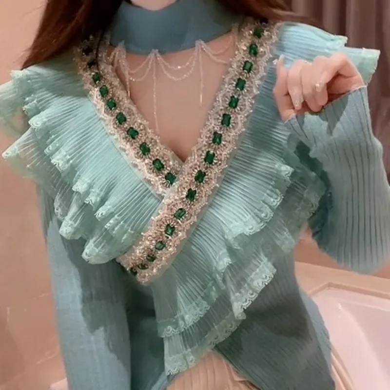 2025 Spring Autumn Women Sweater Coat Thin Heavy Industry Gemstone Lace Edge Knitted Top New Cross V-neck Sweater
2025 Spring Autumn Women Sweater Coat Thin Heavy Industry Gemstone Lace Edge Knitted Top New Cross V-neck Sweater