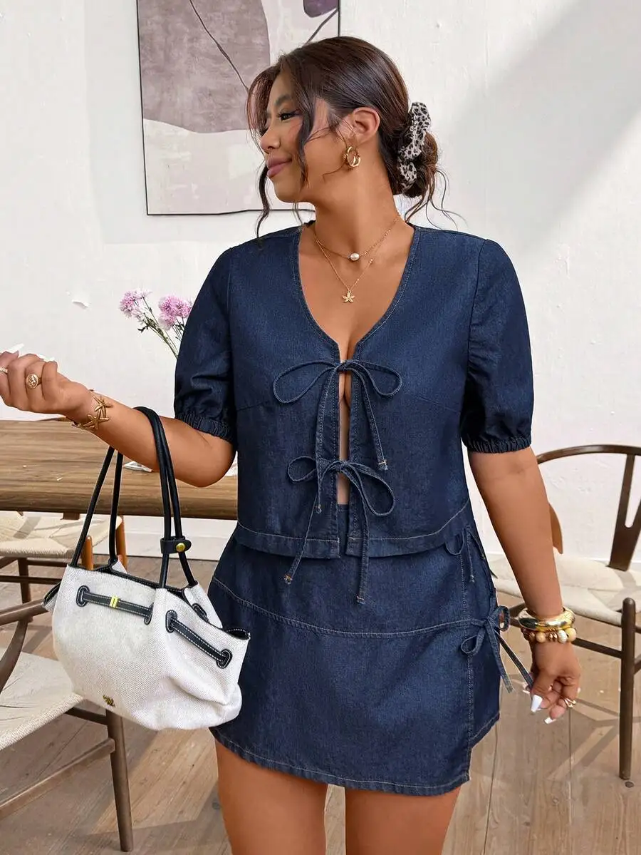 Denim Two Piece Set For Women: Puff Sleeve Crop Top With Front Tie Detail And Wrap Mini Skirt, Plus Size Summer Casual Outfit
Denim Two Piece Set For Women: Puff Sleeve Crop Top With Front Tie Detail And Wrap Mini Skirt, Plus Size Summer Casual Outfit