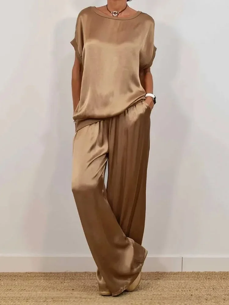 GELITAYIN Spring Summer Fashion Smooth Satin Two Piece Sets Women's Outfits New O-neck Short Sleeve Top Wide Leg Pant Casual Loo
GELITAYIN Spring Summer Fashion Smooth Satin Two Piece Sets Women's Outfits New O-neck Short Sleeve Top Wide Leg Pant Casual Loo